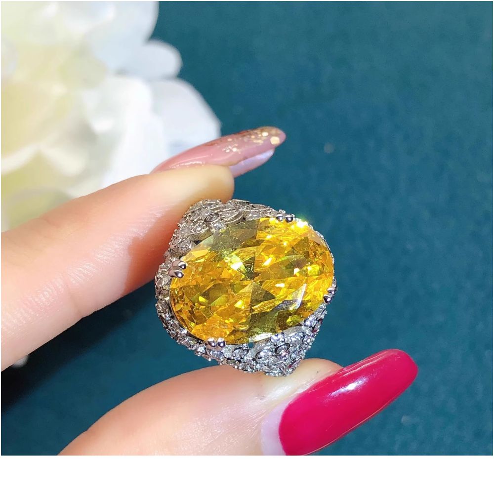 Youngever s new pigeon egg ruby ring for women s luxury high end mesh bottom design with side full of diamond colored treasures image 6