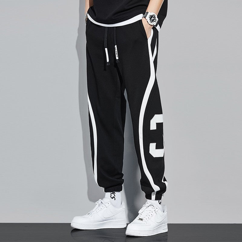 Tight side stripe feet sports sweatpants