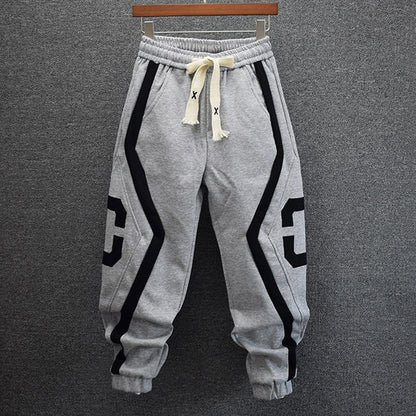 C-shaped sweatpants loose leg-tie