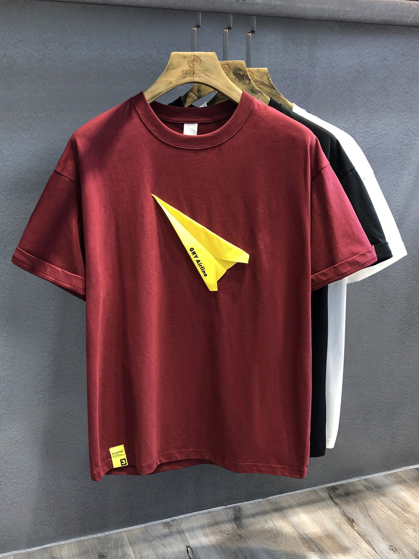 Men's T-shirts creative paper airplane sticker embroidered short sleeved T-shirt