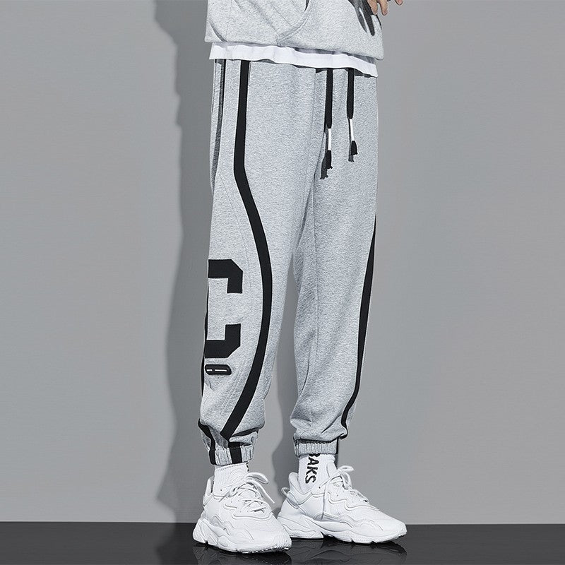 Tight side stripe feet sports sweatpants