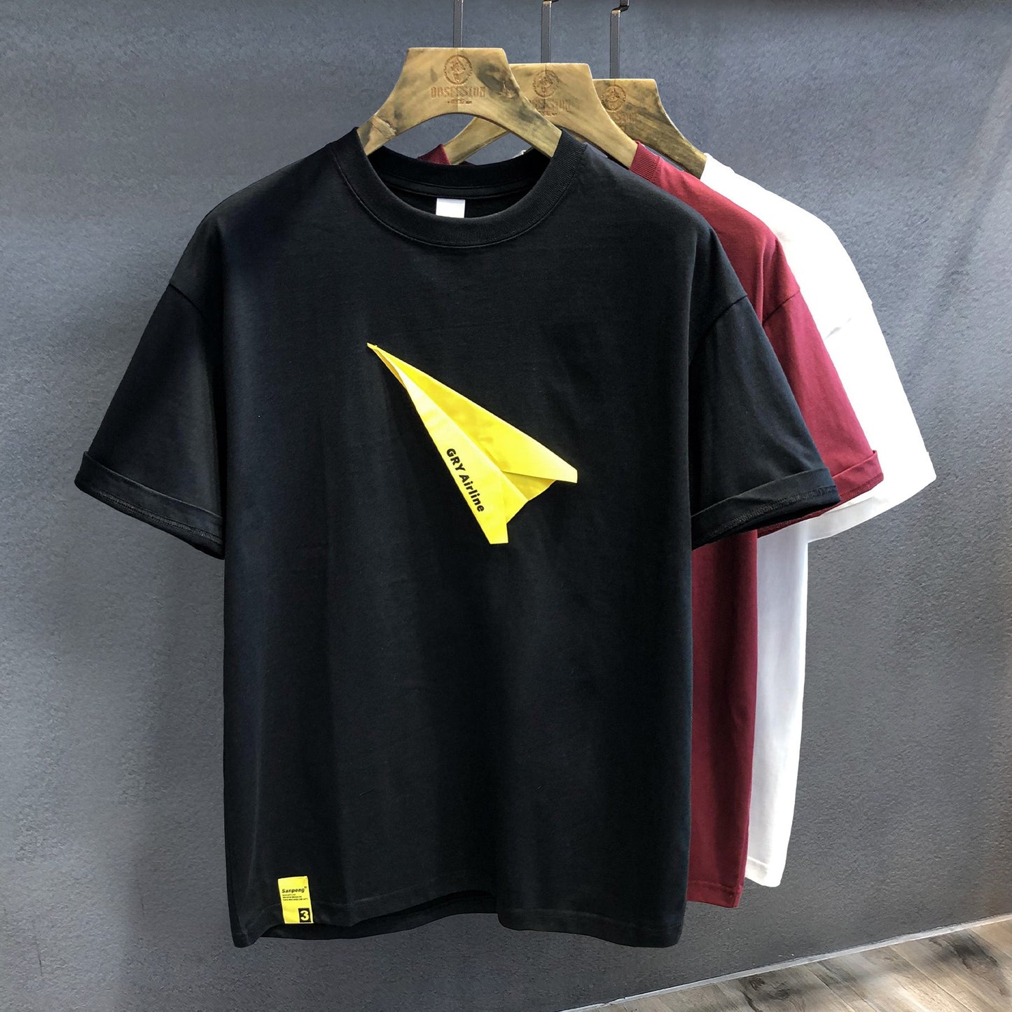 Men's T-shirts creative paper airplane sticker embroidered short sleeved T-shirt