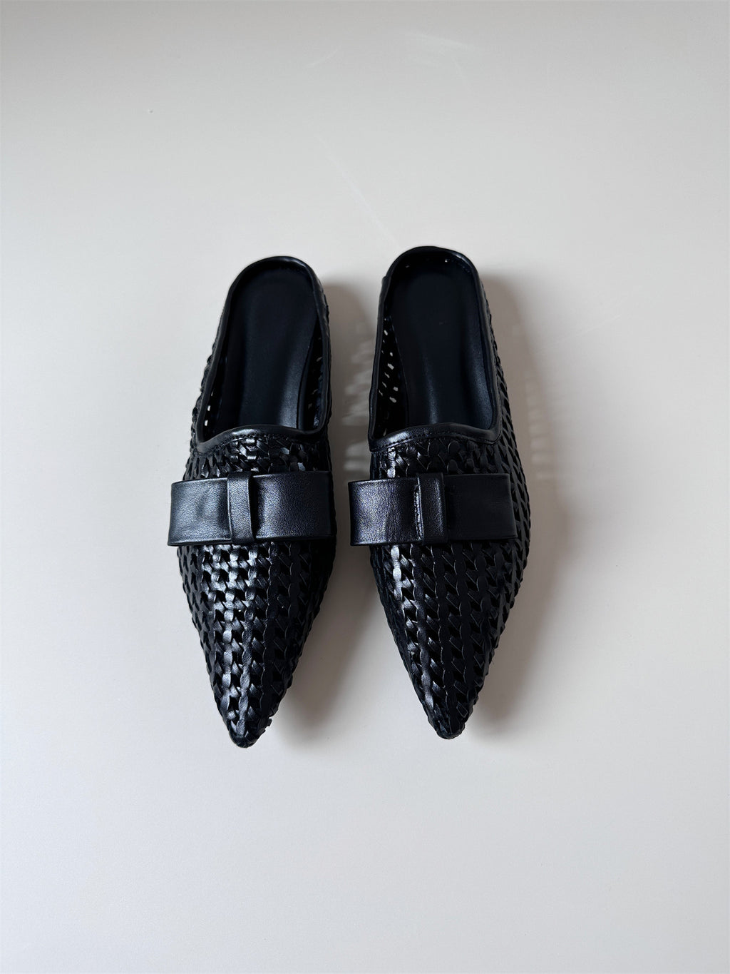 Woven leather flat half-slip sandals