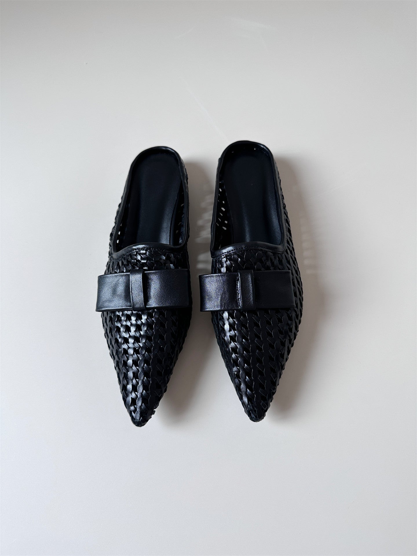 Woven leather flat half-slip sandals