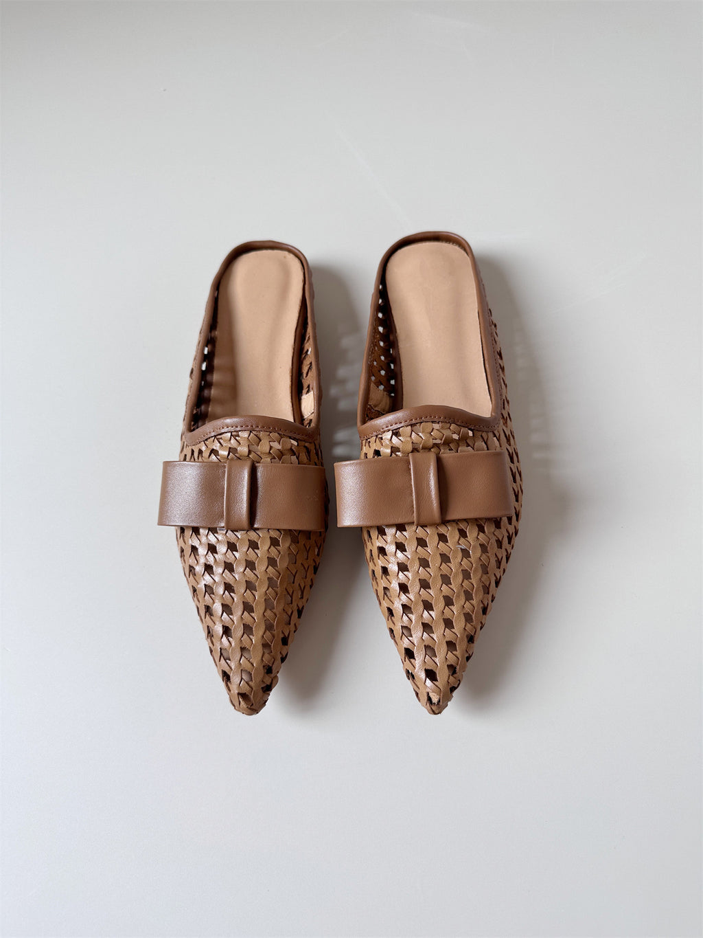 Woven leather flat half-slip sandals