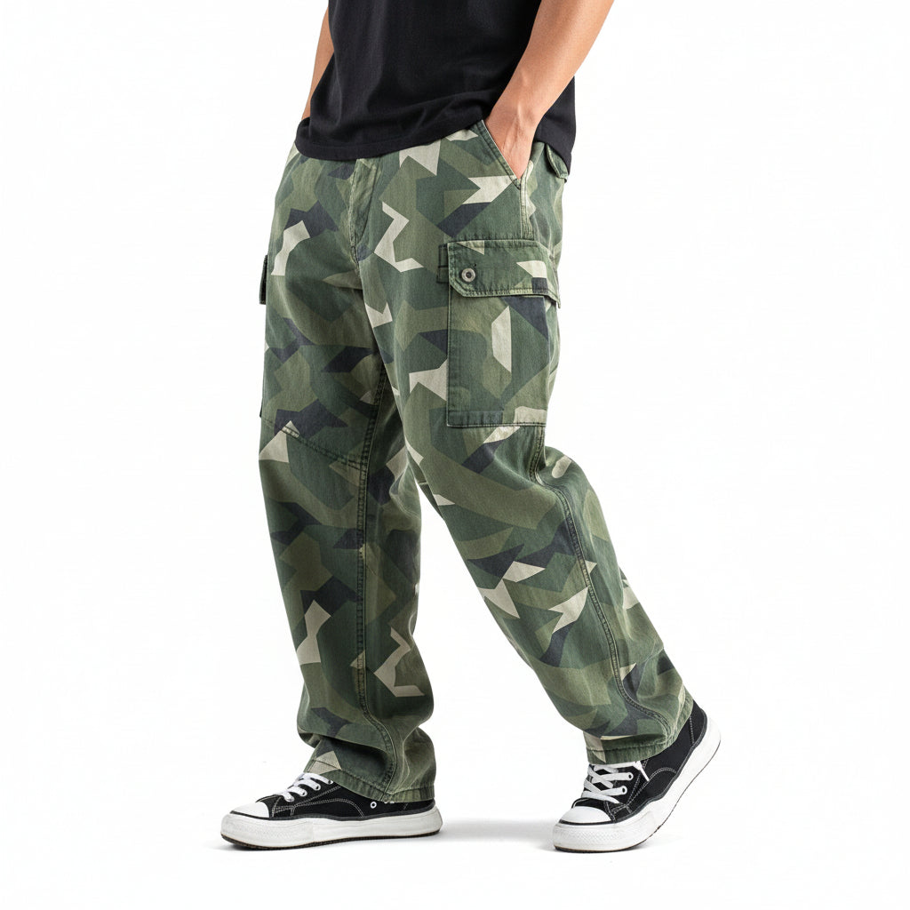 Distressed camouflage trousers bold paint-splatter accents pants