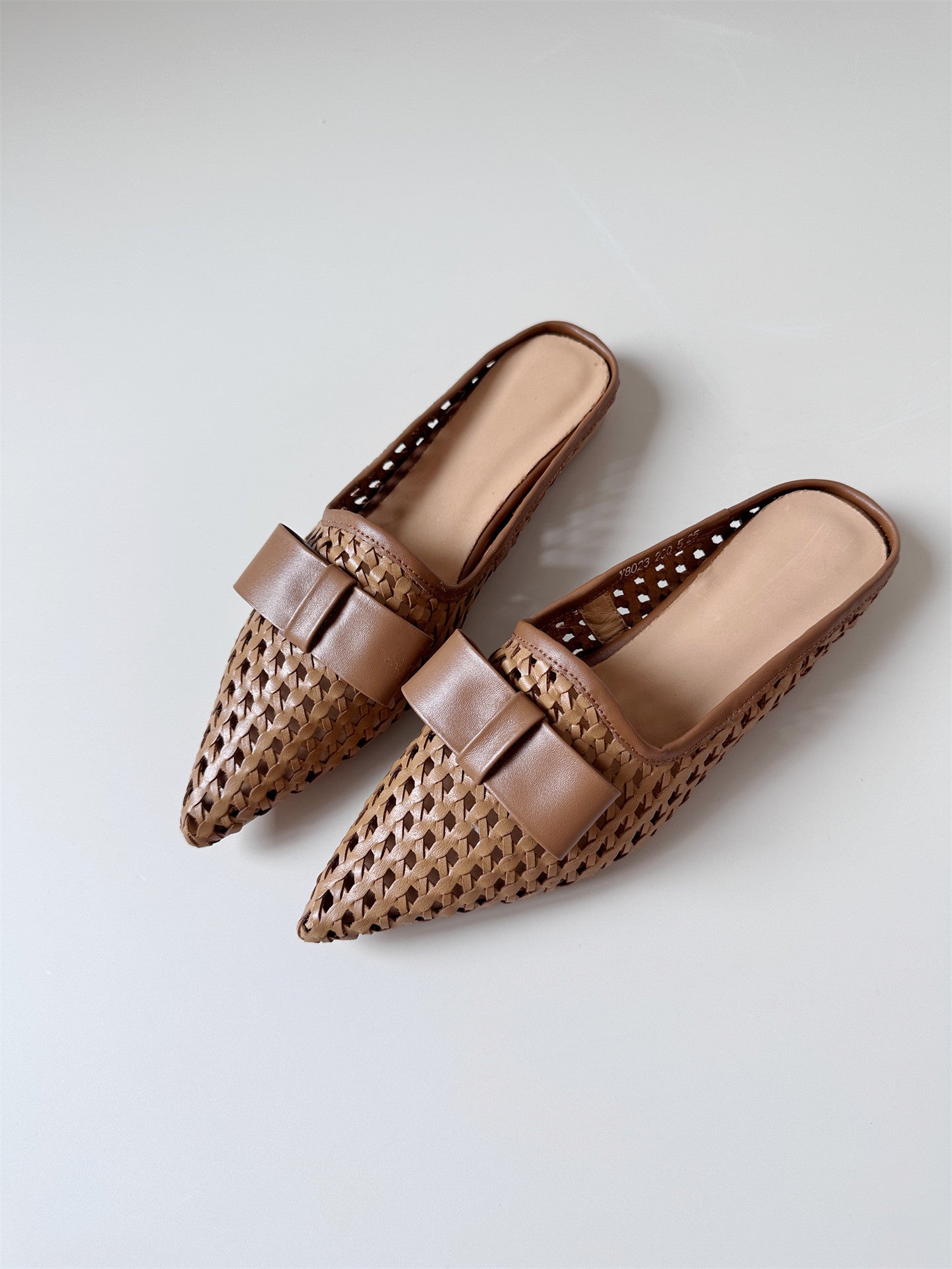 Woven leather flat half-slip sandals