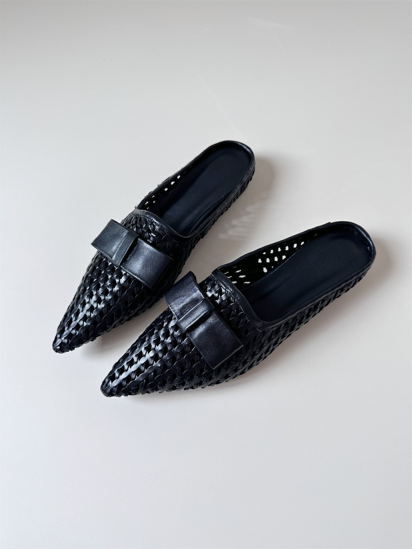 Woven leather flat half-slip sandals