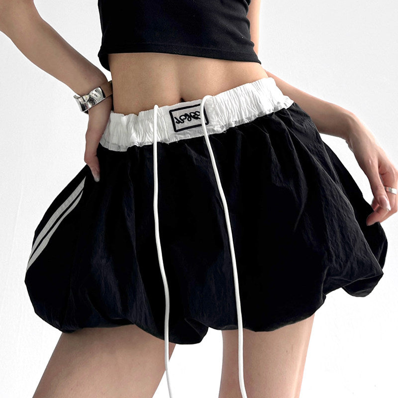 Letter color-blocking flower bud skirt 2026 super hot summer new sexy hot girl puffy skirt A-line anti-light shorts skirt