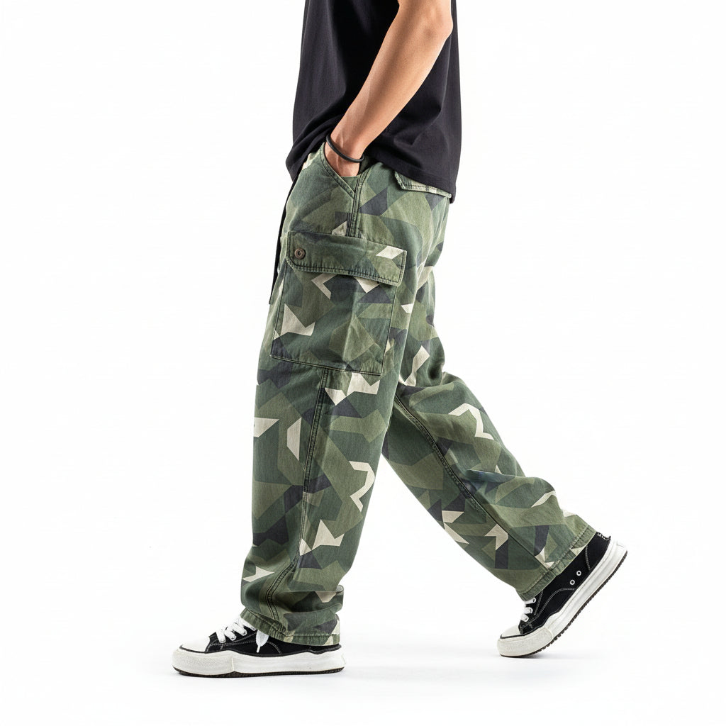 Distressed camouflage trousers bold paint-splatter accents pants
