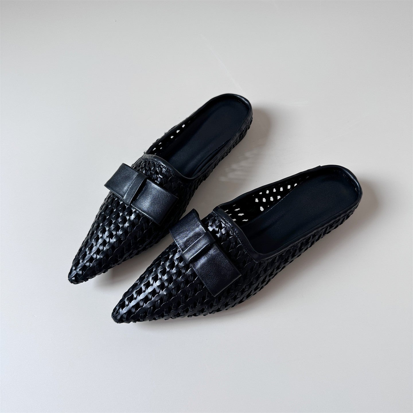 Woven leather flat half-slip sandals