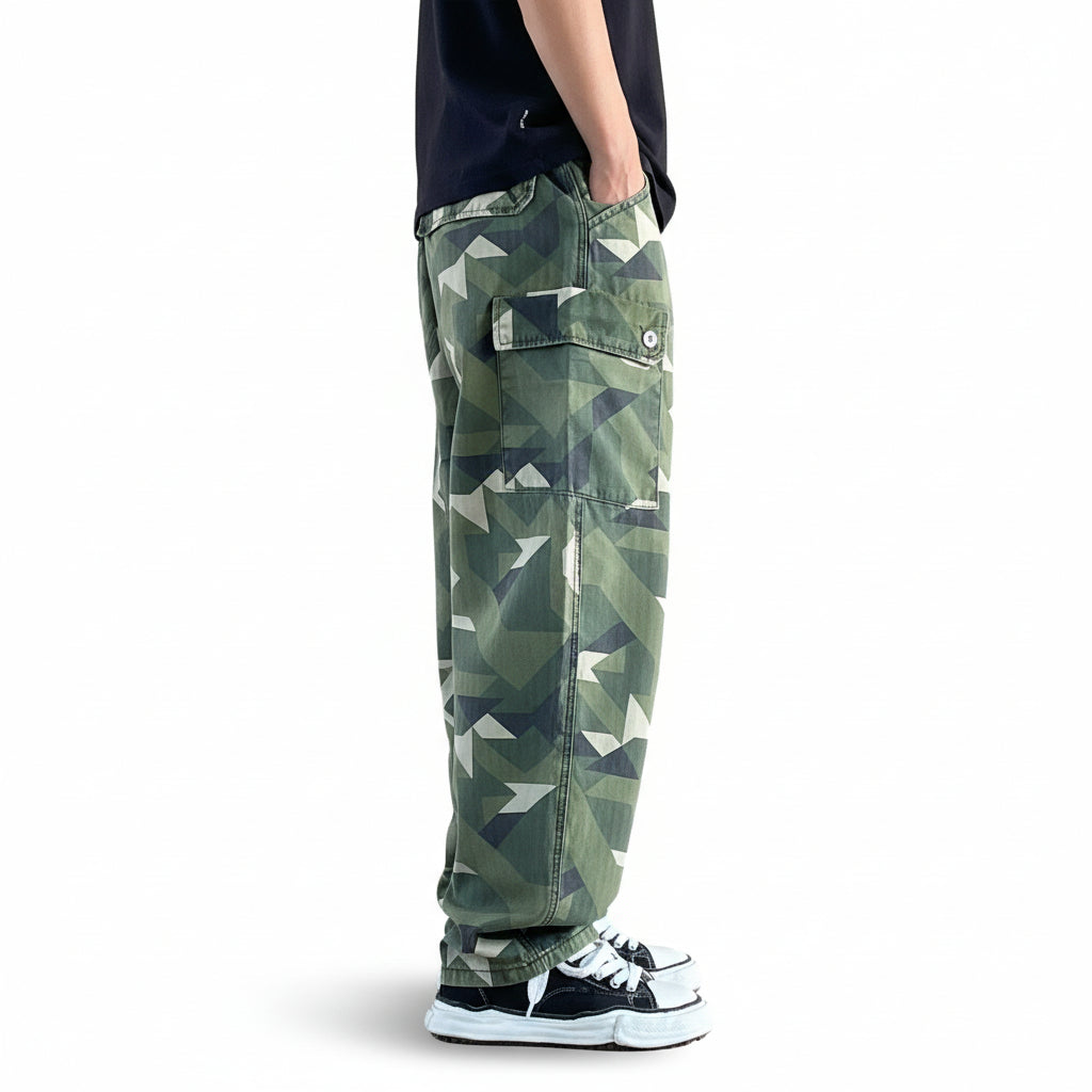 Distressed camouflage trousers bold paint-splatter accents pants
