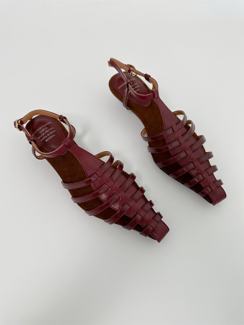 Gold mid wedge heel pointed toe sandals