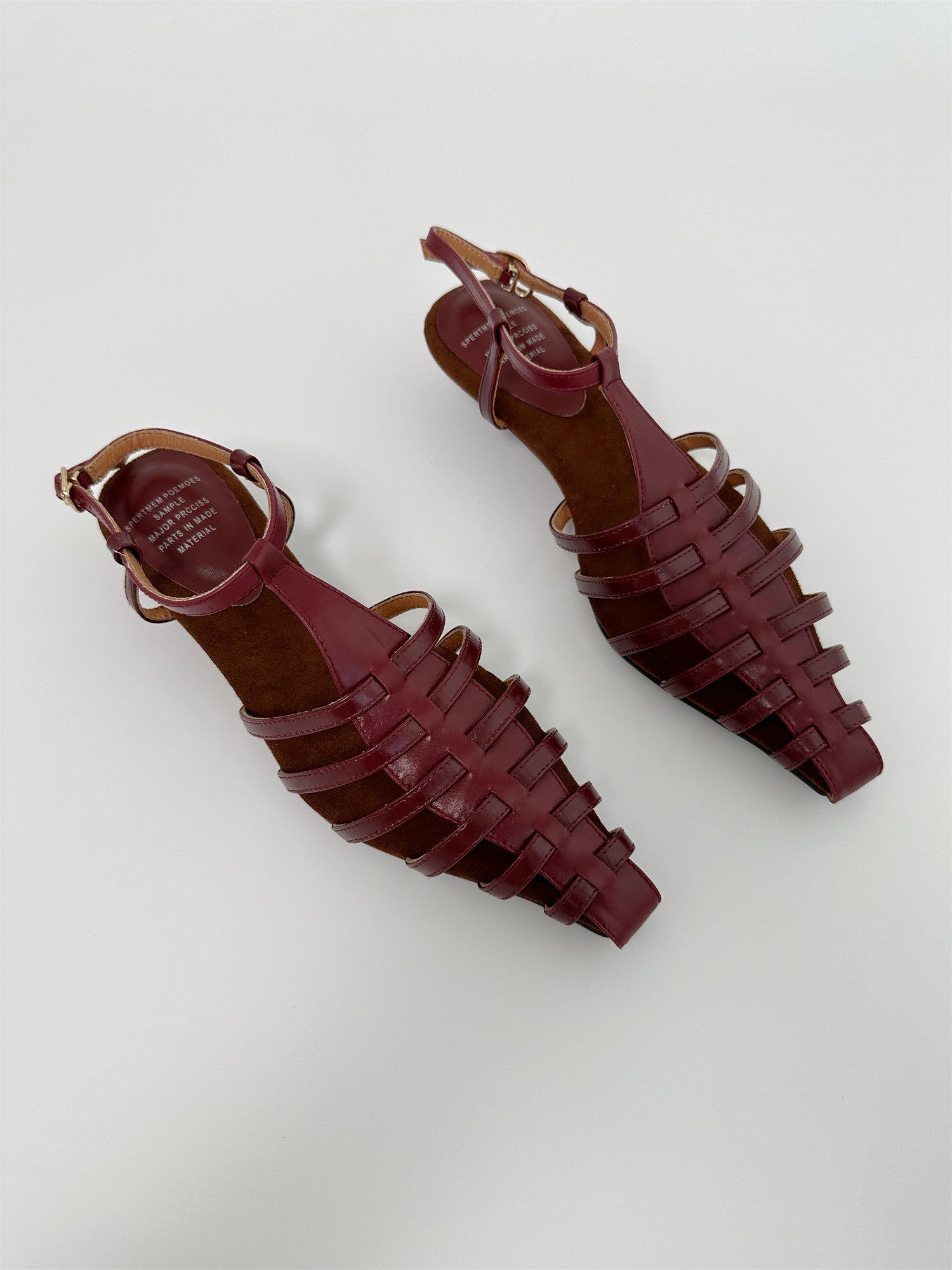 Gold mid wedge heel pointed toe sandals