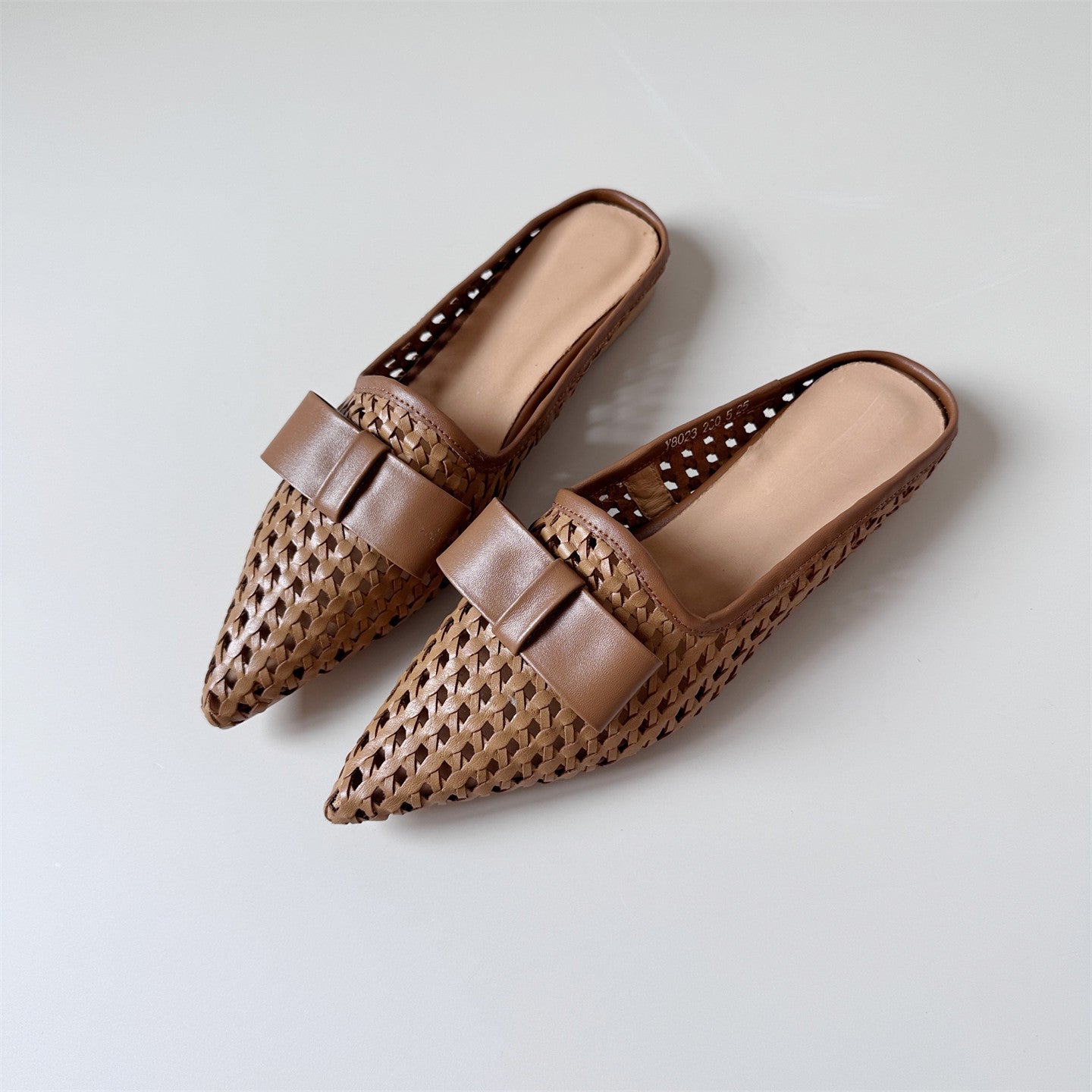 Woven leather flat half-slip sandals
