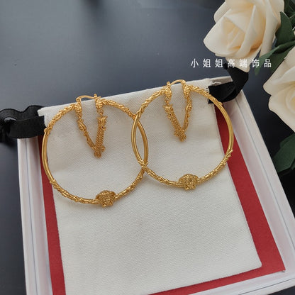 V-shaped letter earrings portrait accessory